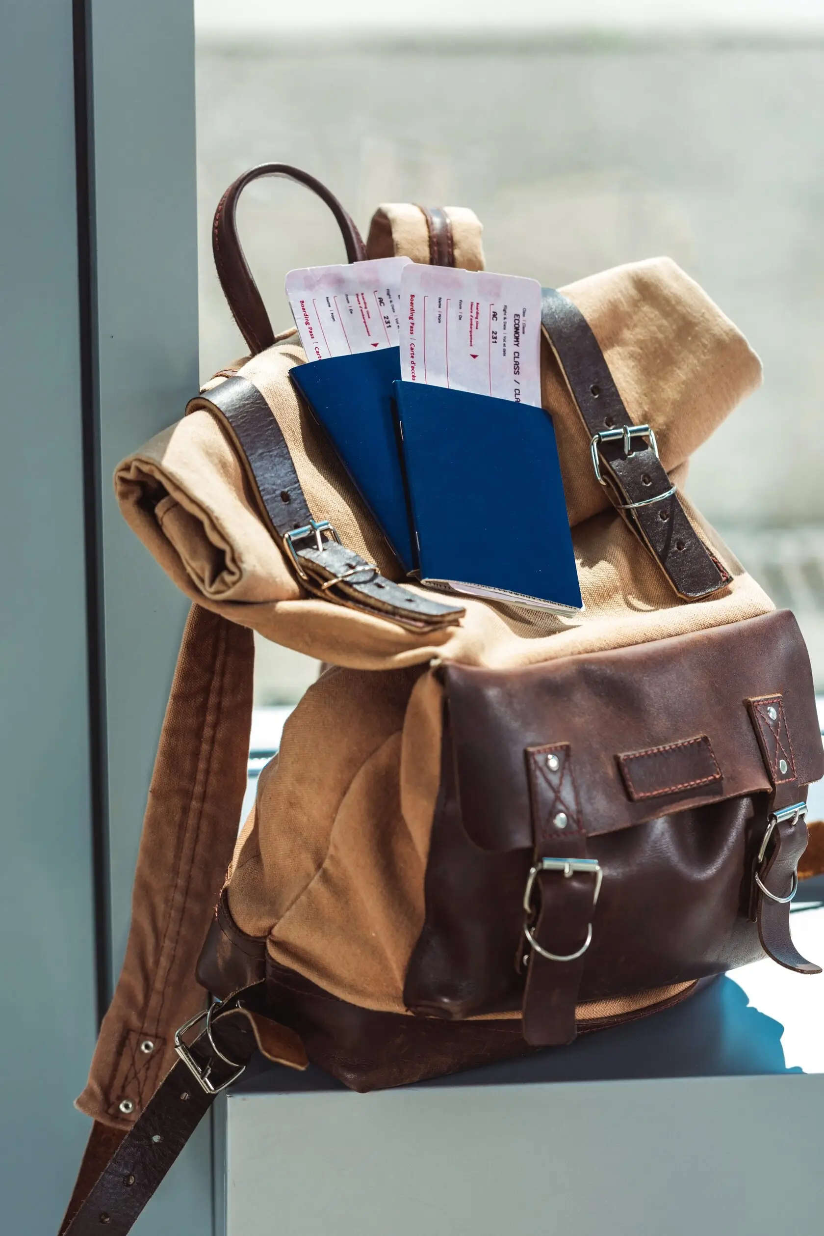 Traveler's backpack with passport and camera